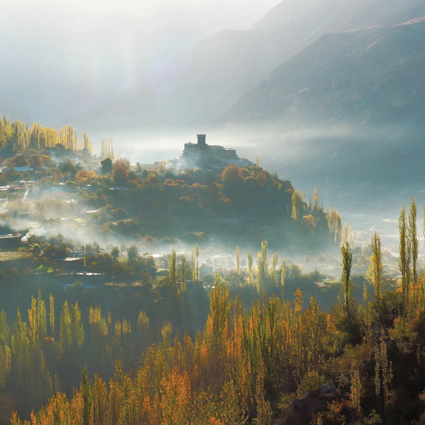 Close Up Of Altit Fort With Surrounding Mist In Hunza Valley In