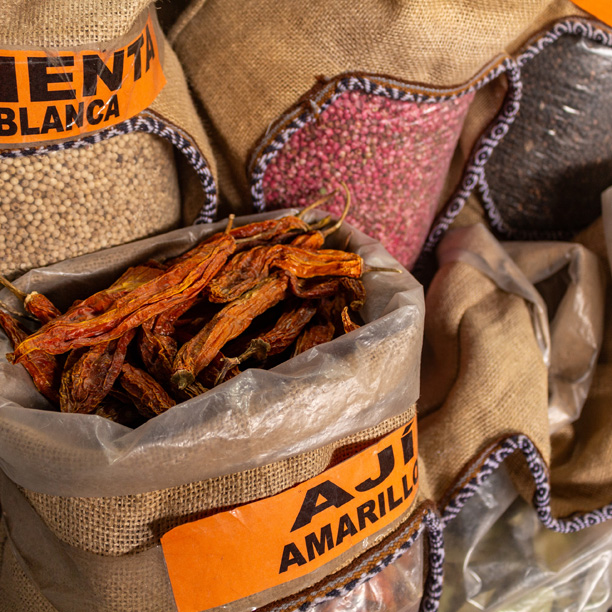 Bags of spices in a municipal market in Cusco