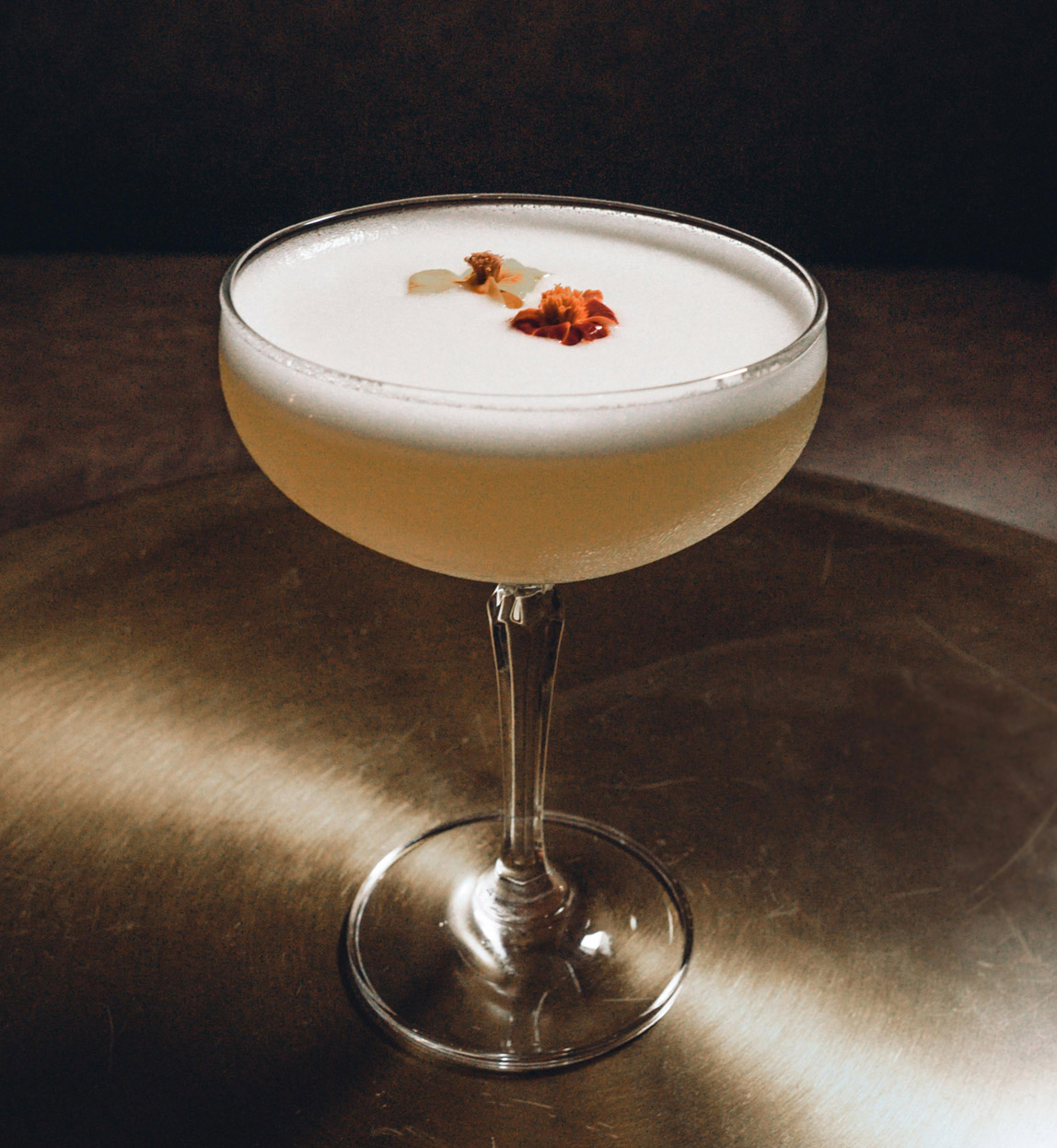 pisco sour glass in lima, peru on a luxury culinary journey