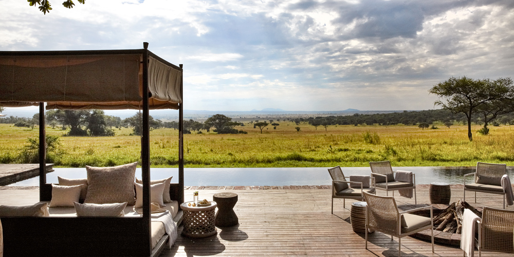 view from the verandah and pool of singita serengeti house across the plains