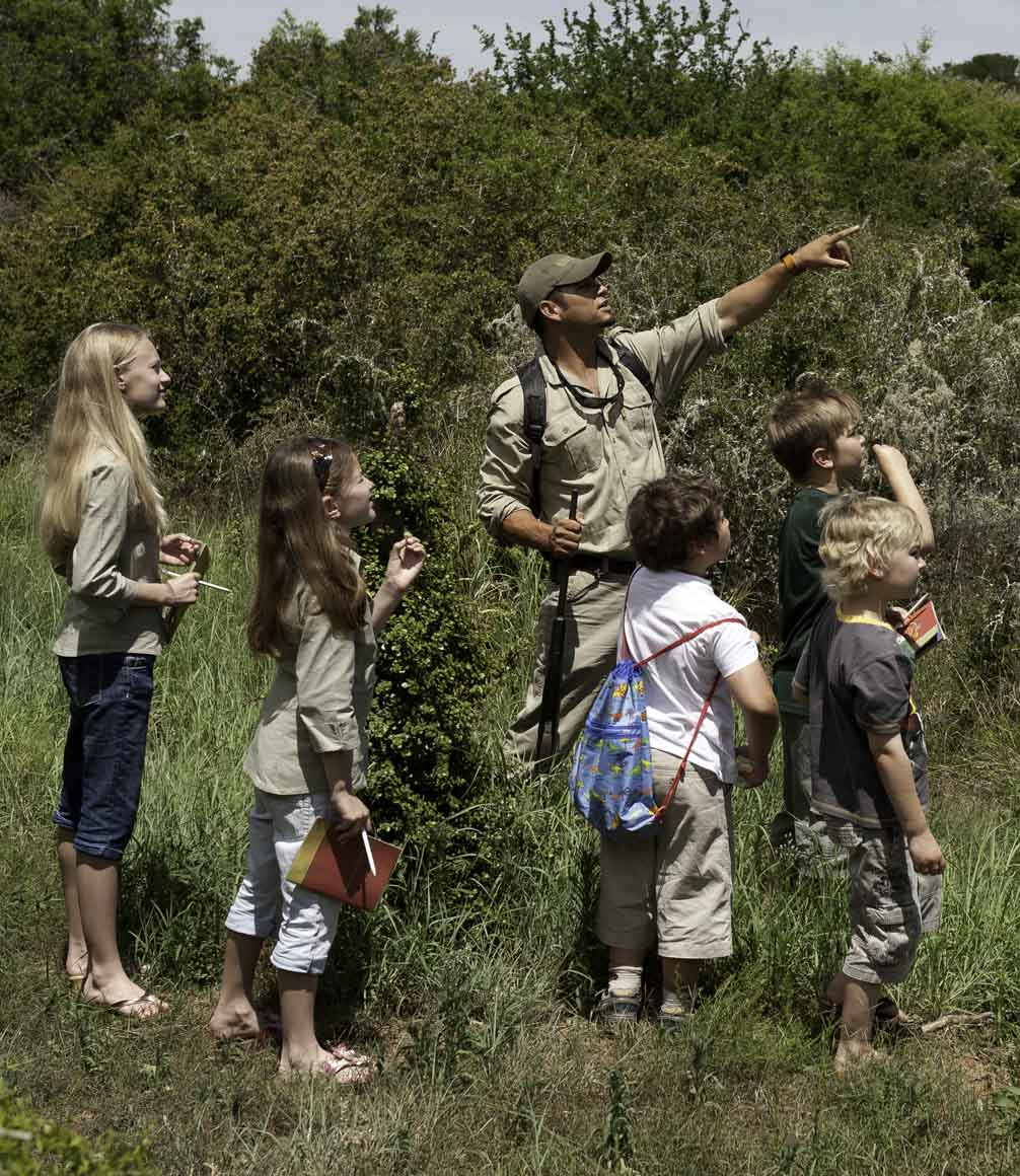 family safari children on safari with guide