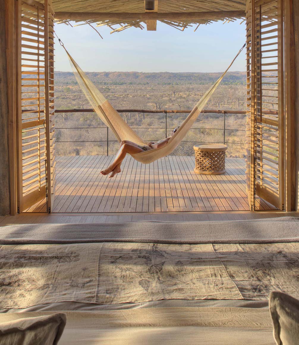hammock in doorway of tented suite at jabali ridge