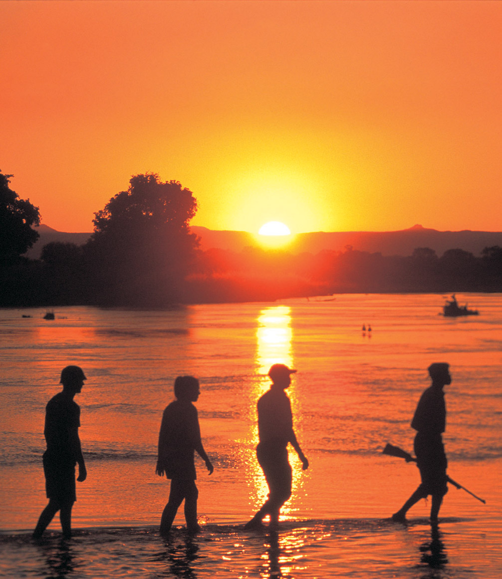 people on walking safari in zambia with the bushcamp company