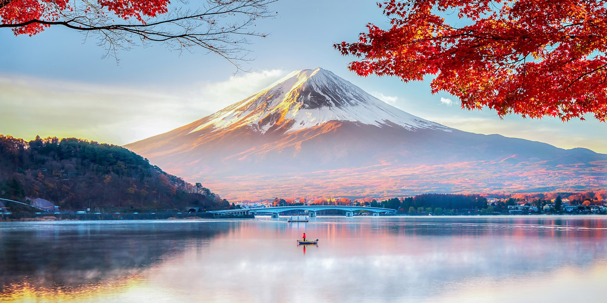 Fisherman Boat with Fuji Moutnain bacgkround in Morning Mist Autumn, Kawaguchikok Lake, Japan