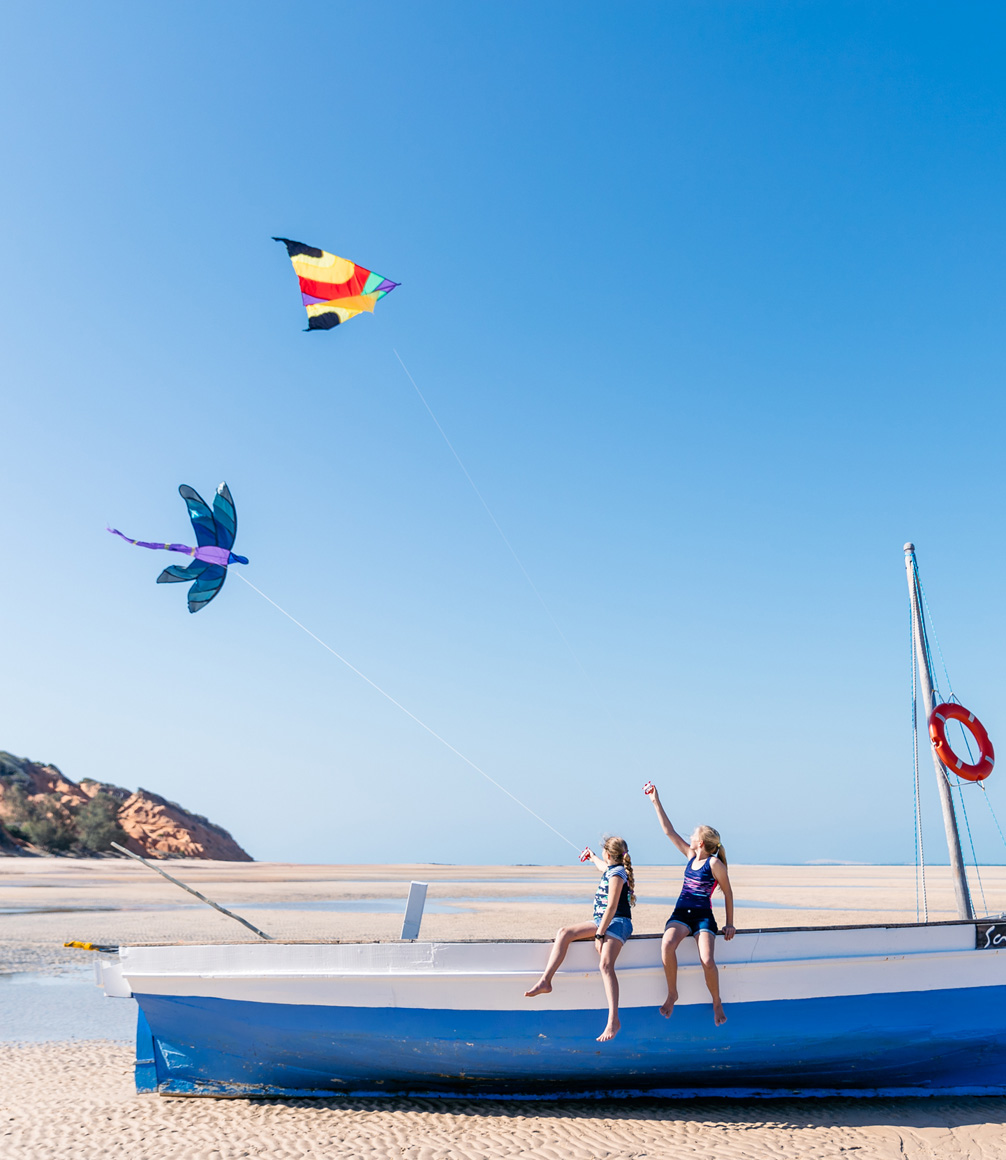 Mozambique family safari Kids flying Kite