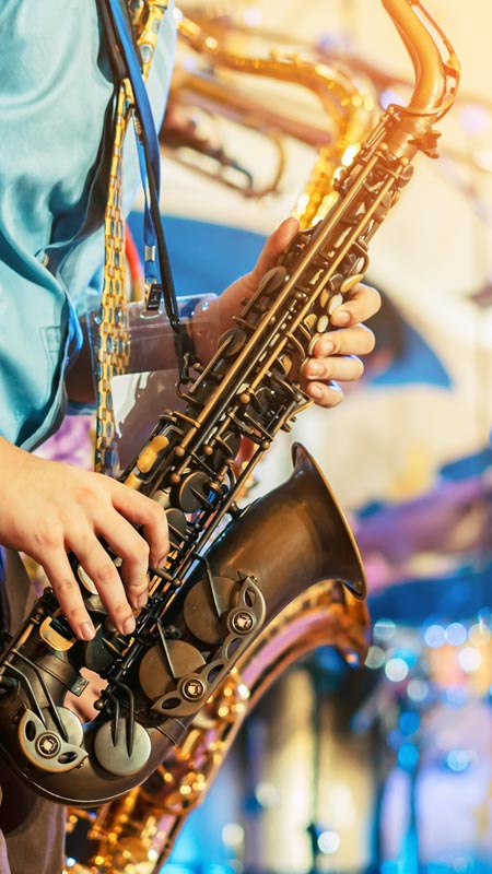 jazz musician playing a saxophone