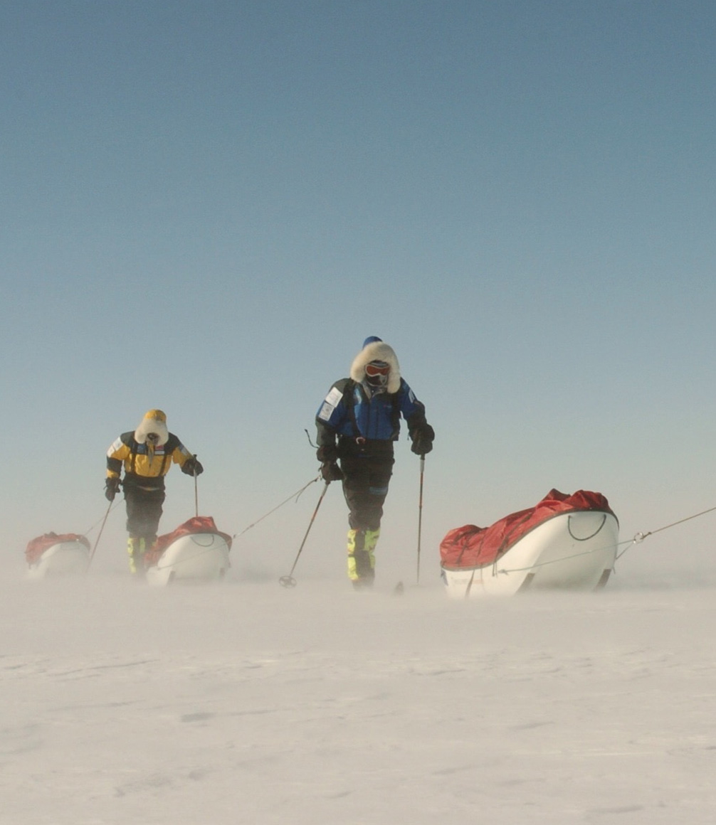 patrick woodhead and team trekking to the south pole in antarctica