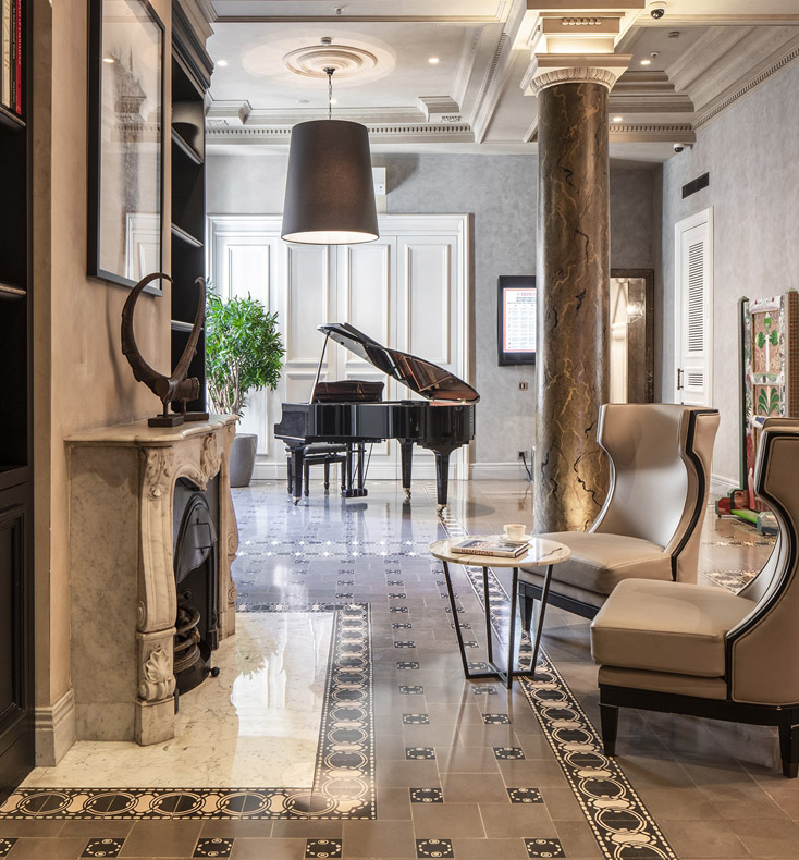 the lobby and piano at the bank house in turkey